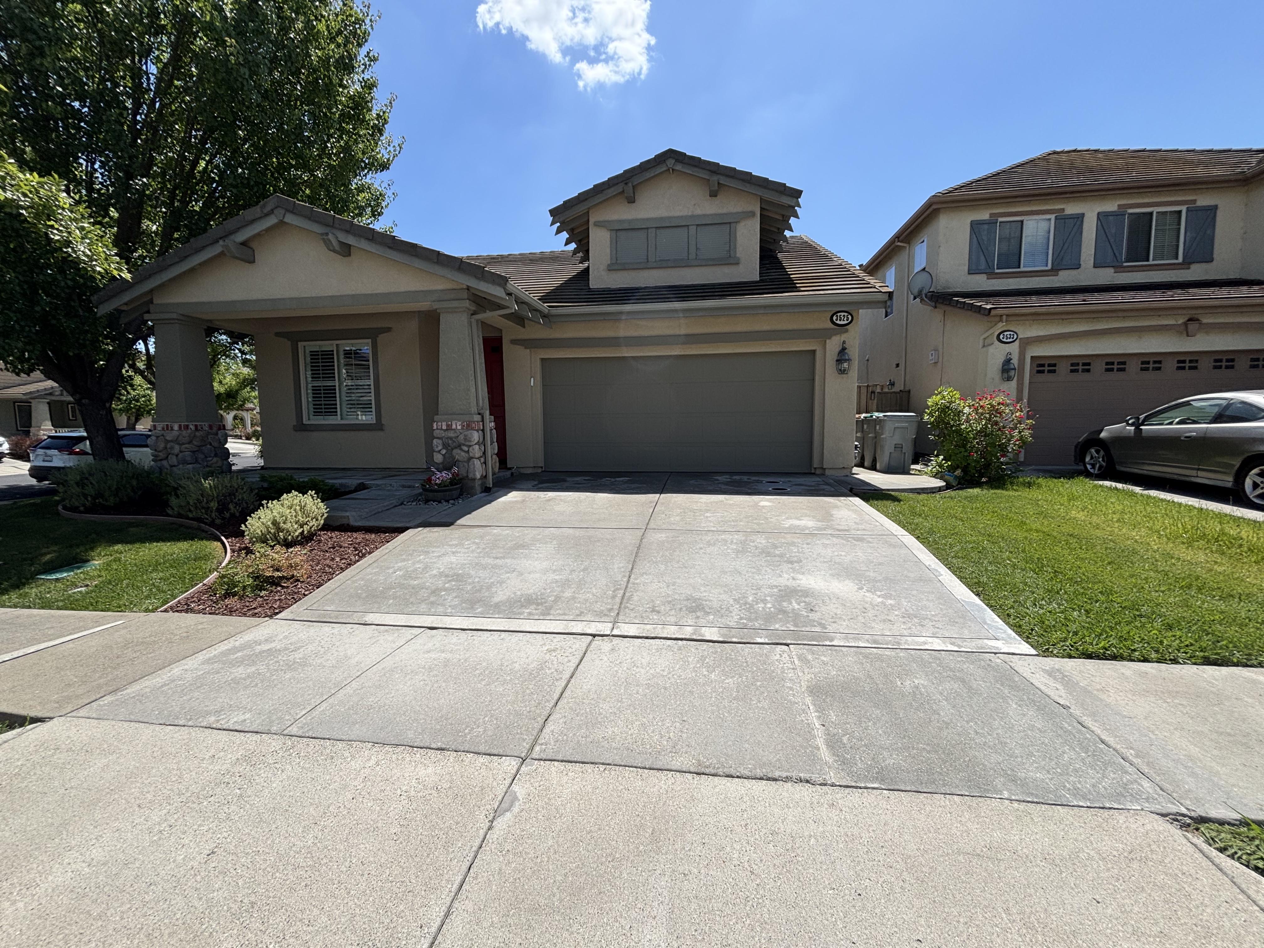 Driveway before pressure washing — Wash Works Sacramento